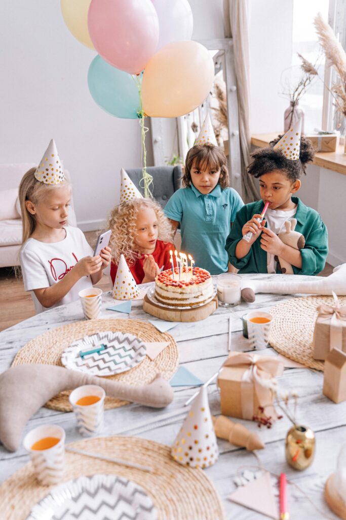 kids budget party - kids around a party table